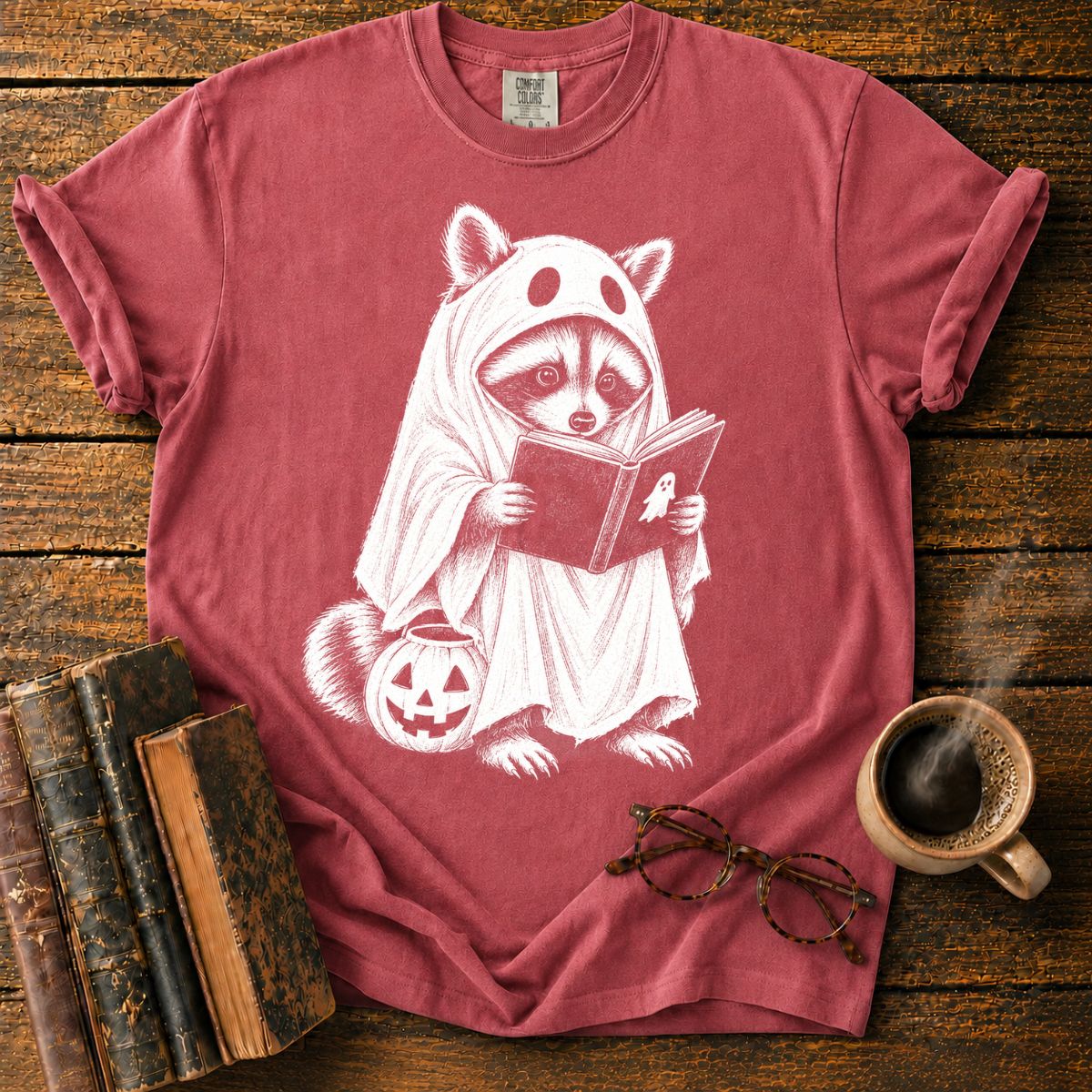 Ghostly Raccoon Reading by Pumpkin T-Shirt
