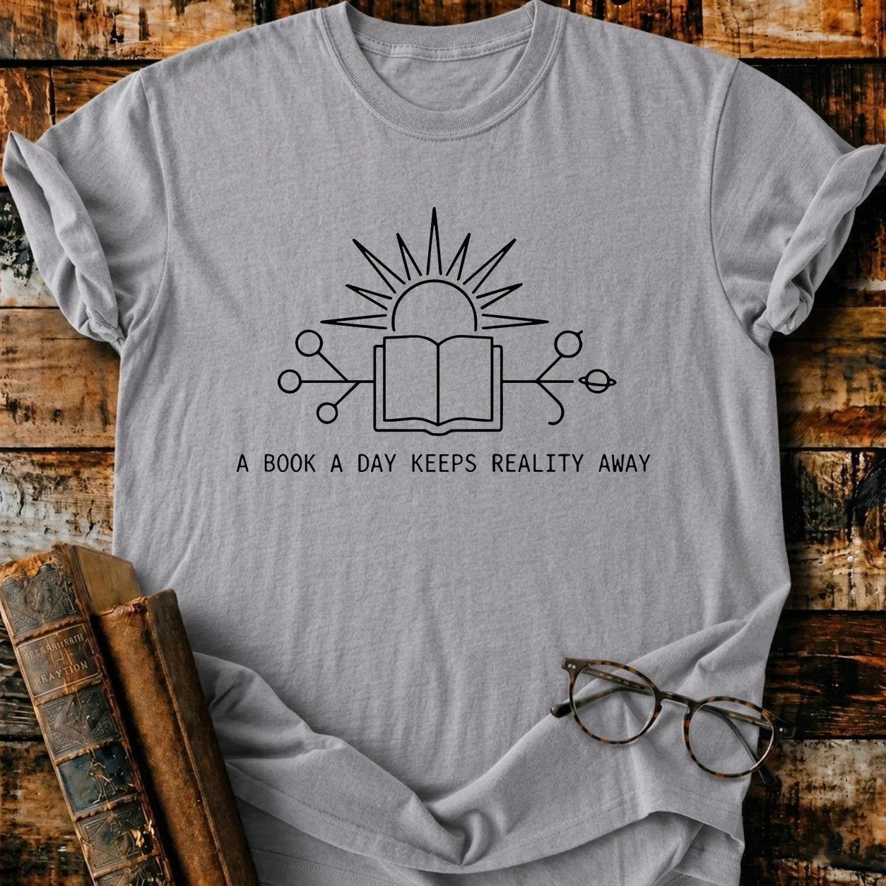 A Book A Day Keeps Reality Away T-Shirt