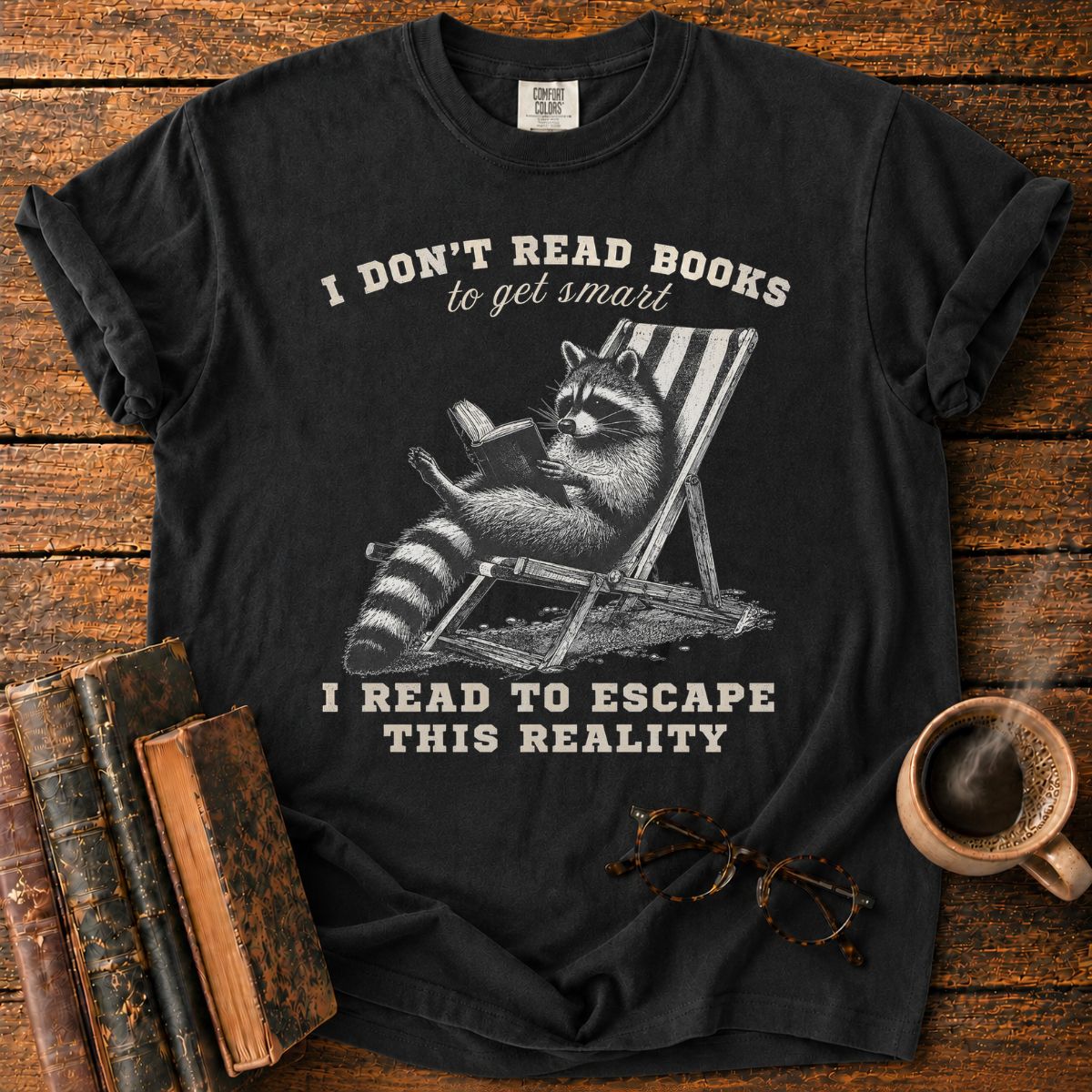 Raccoon Reading in Relaxed Escape T-Shirt