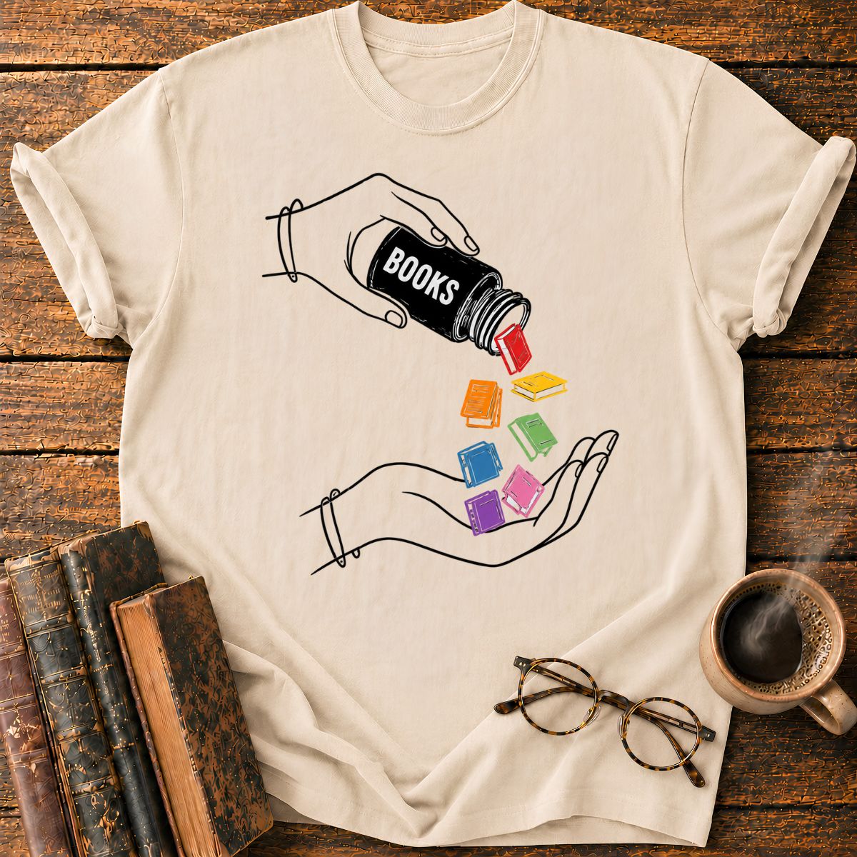 Pouring Books into Open Hands T-Shirt