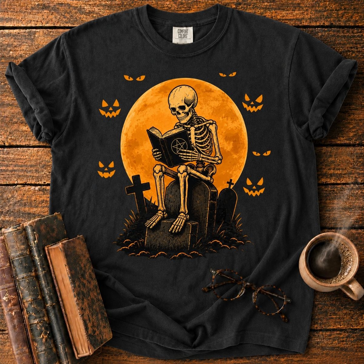 Skeleton Reading Beneath the Pumpkin Moon T-Shirt
