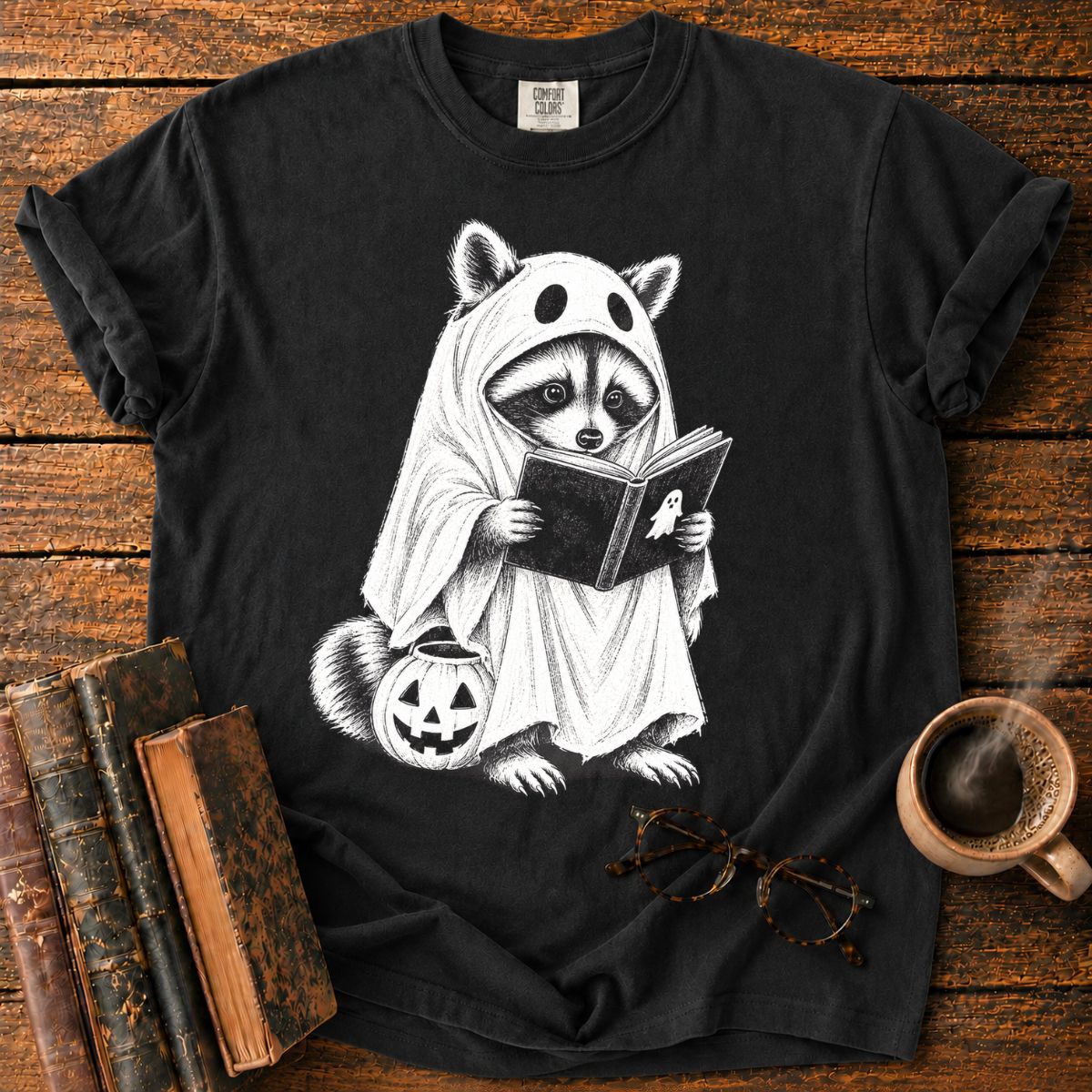 Ghostly Raccoon Reading by Pumpkin T-Shirt