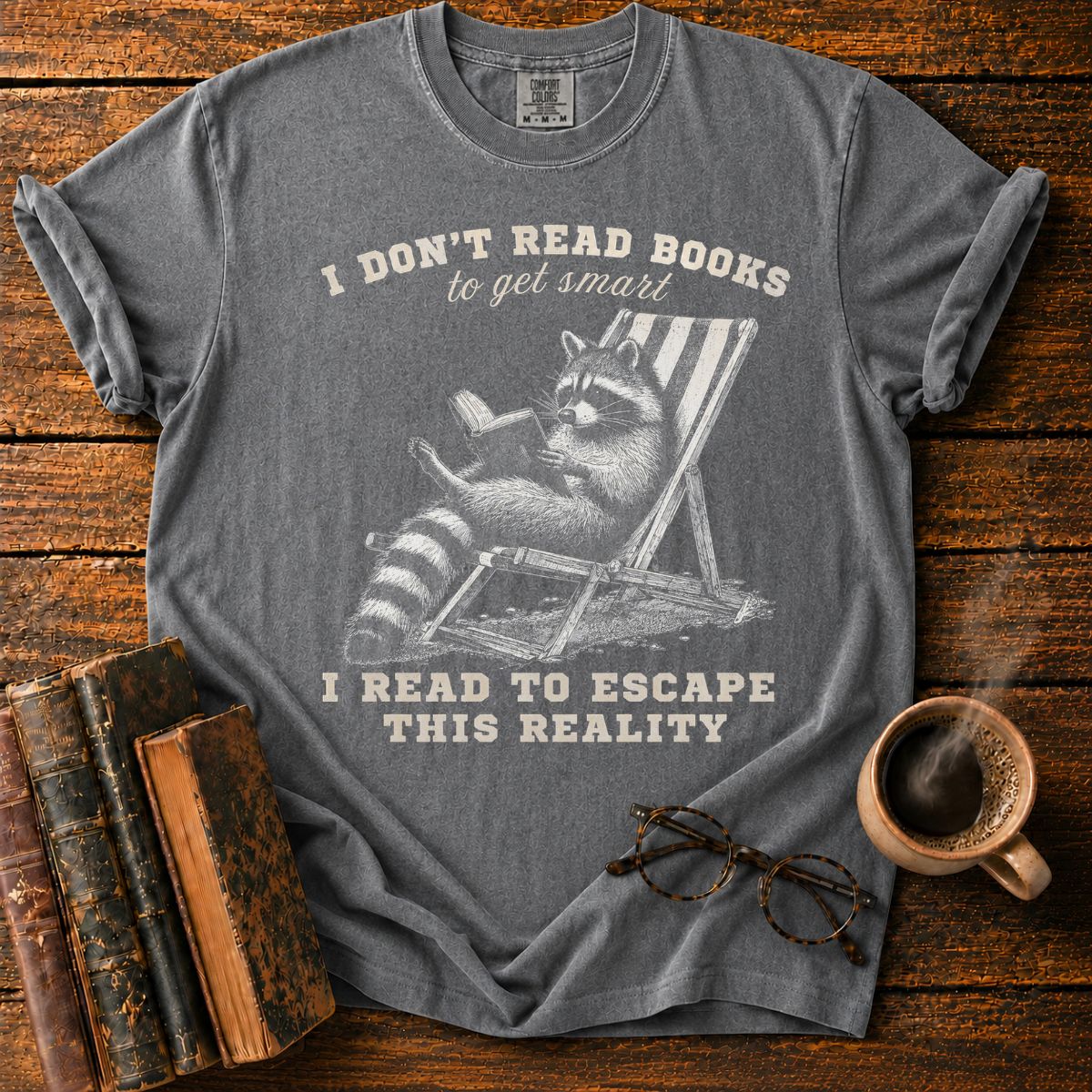 Raccoon Reading in Relaxed Escape T-Shirt