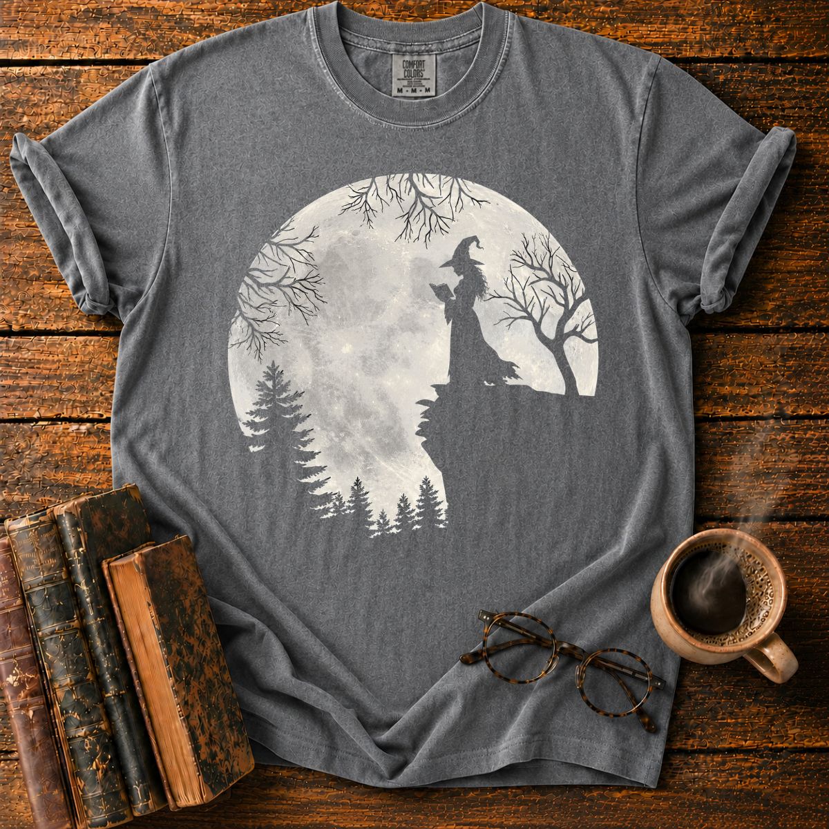 Moonlit Witch Reading on a Rocky Cliff T-Shirt