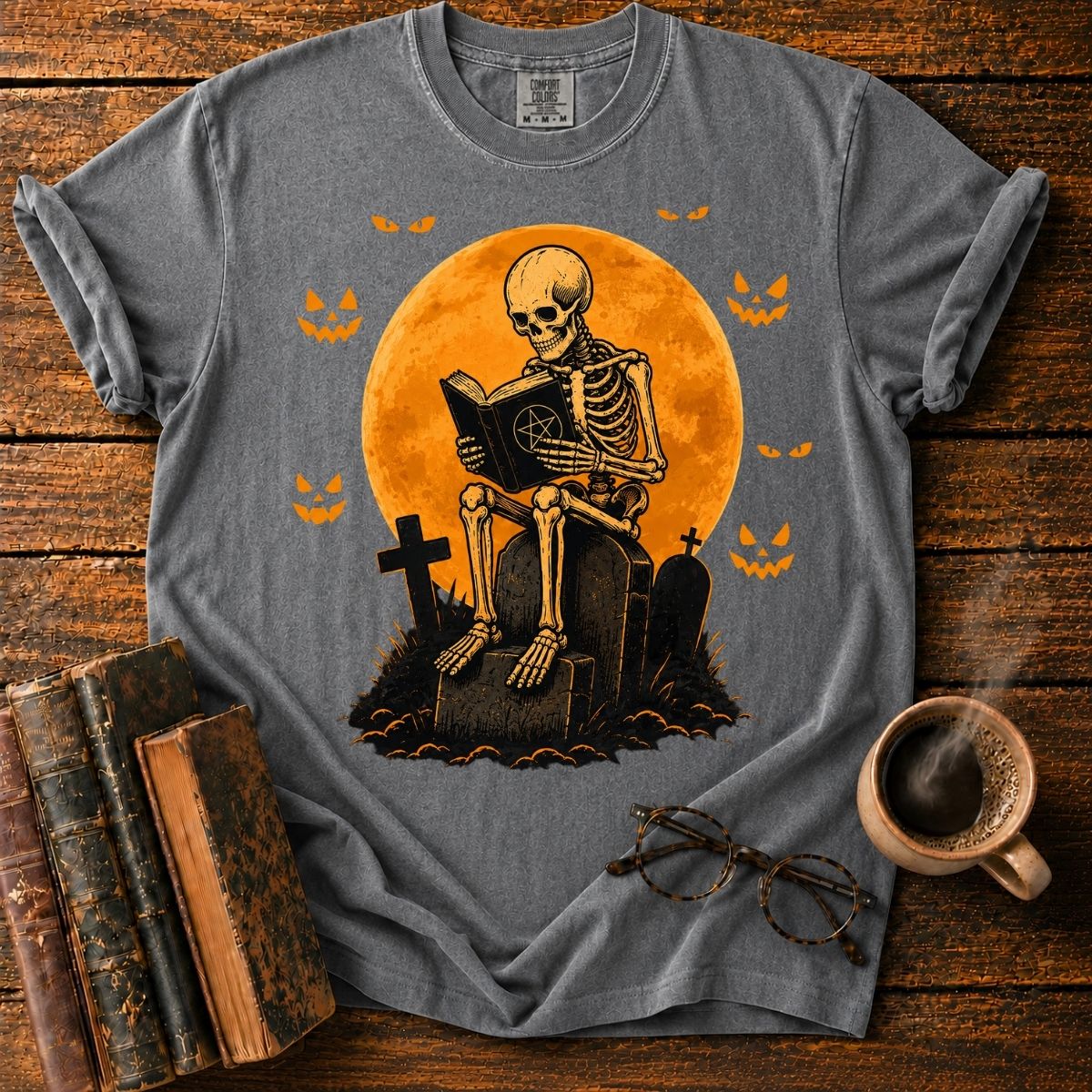 Skeleton Reading Beneath the Pumpkin Moon T-Shirt