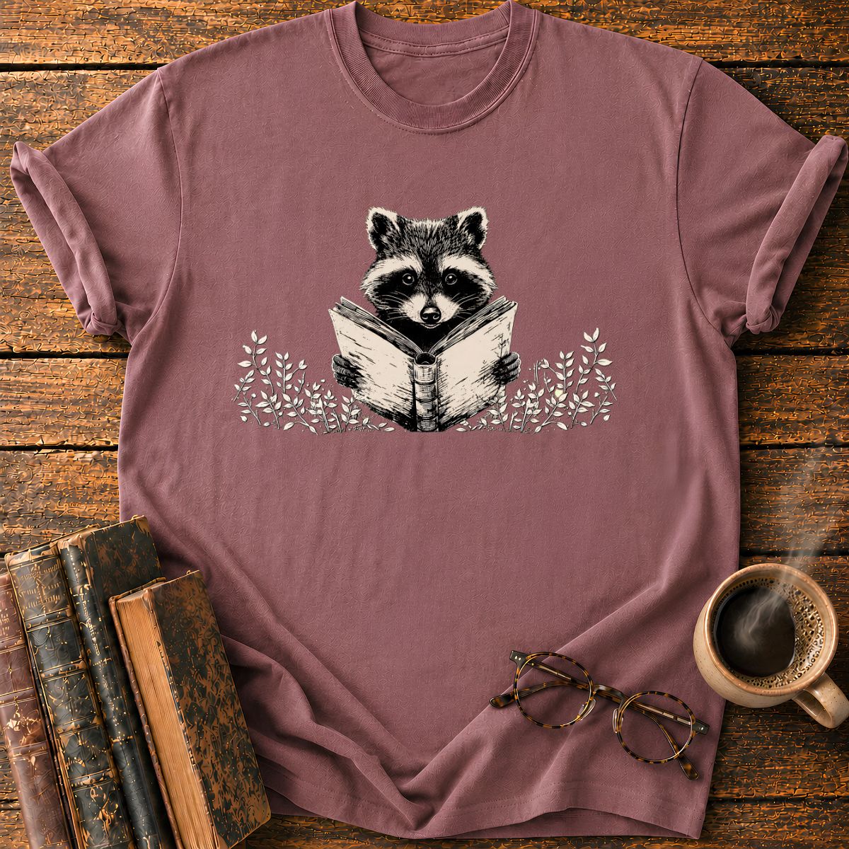 Raccoon Reading Among Leaves T-Shirt