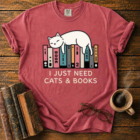 Sleeping Cat Among Colorful Books T-Shirt