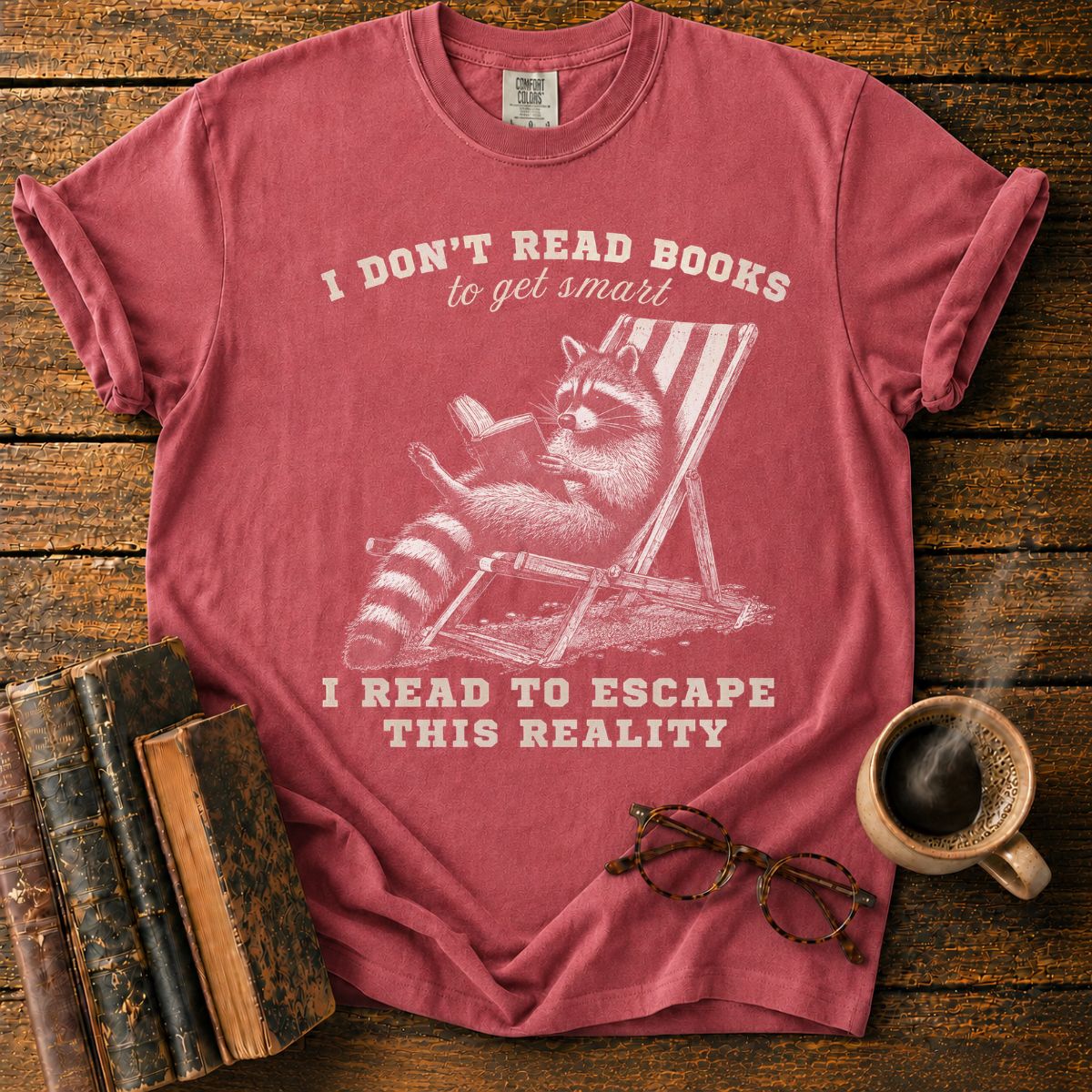 Raccoon Reading in Relaxed Escape T-Shirt