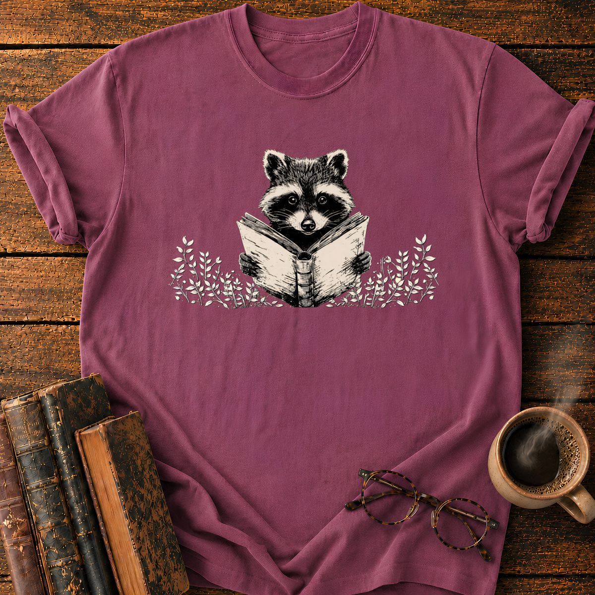 Raccoon Reading Among Leaves T-Shirt