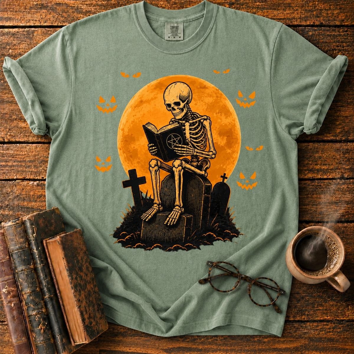 Skeleton Reading Beneath the Pumpkin Moon T-Shirt