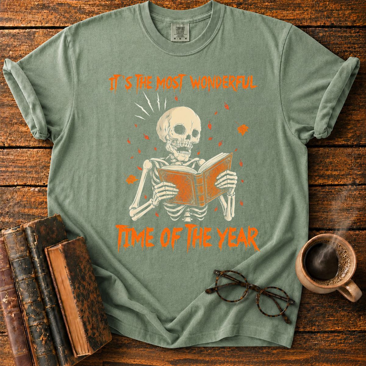 Skeleton Reading Beneath Autumn Leaves T-Shirt