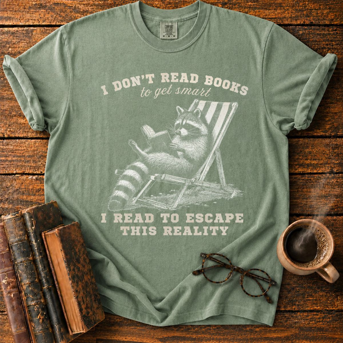 Raccoon Reading in Relaxed Escape T-Shirt