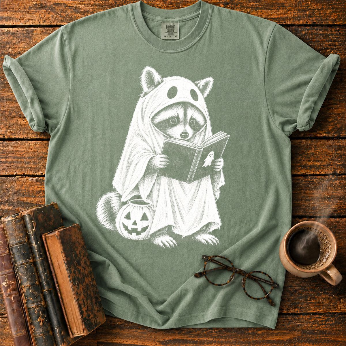 Ghostly Raccoon Reading by Pumpkin T-Shirt
