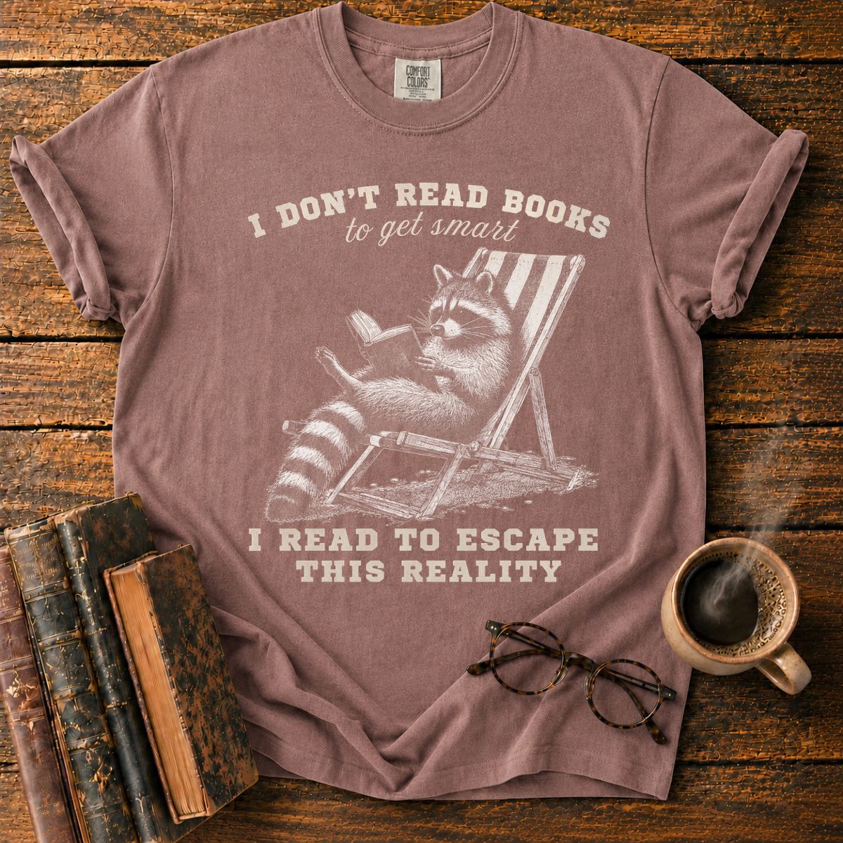 Raccoon Reading in Relaxed Escape T-Shirt