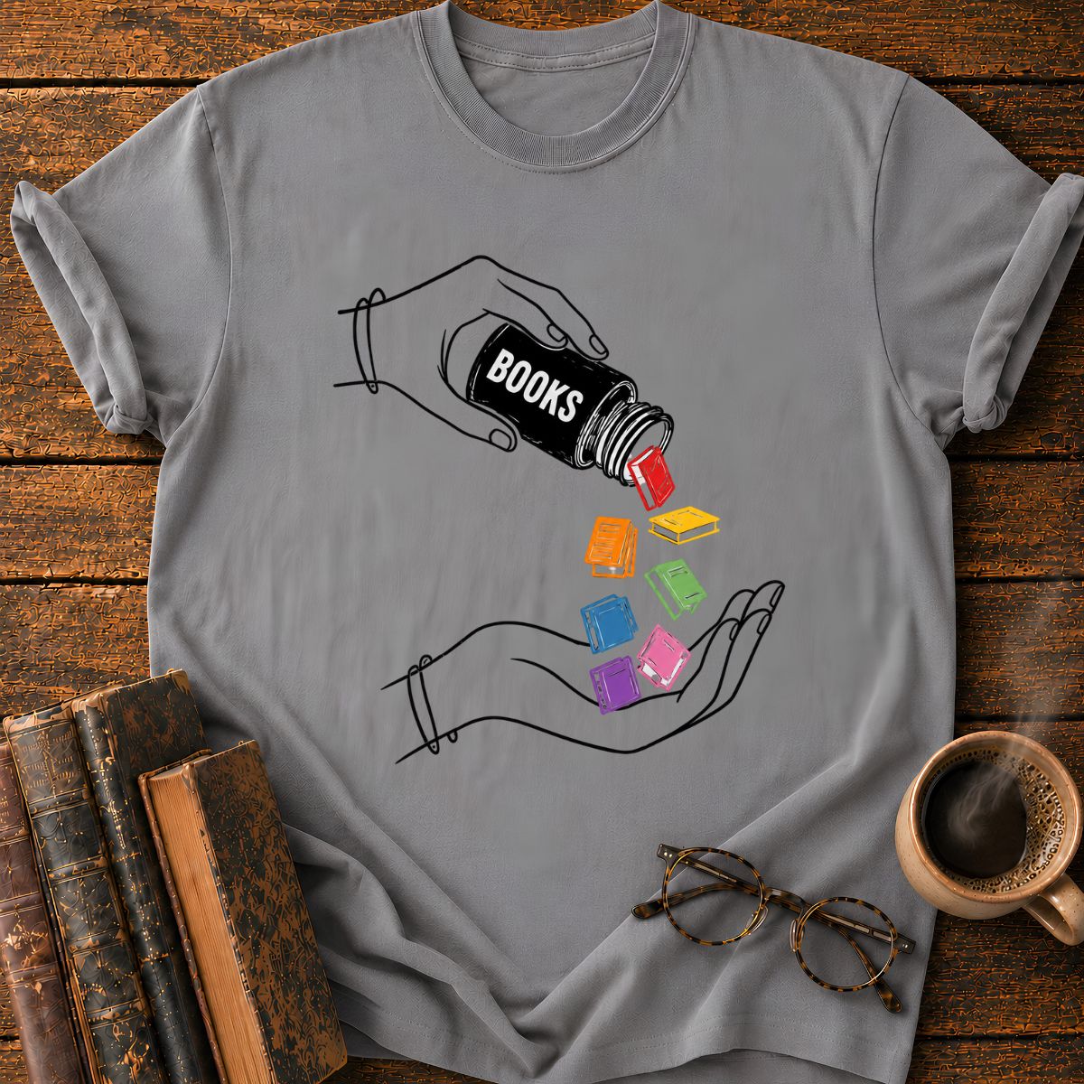 Pouring Books into Open Hands T-Shirt