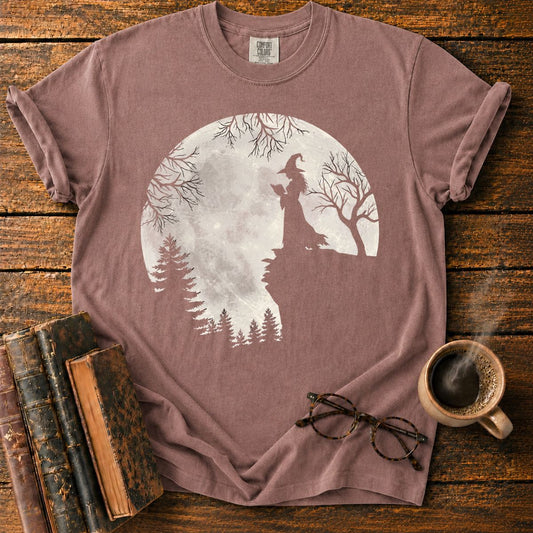 Moonlit Witch Reading on a Rocky Cliff T-Shirt