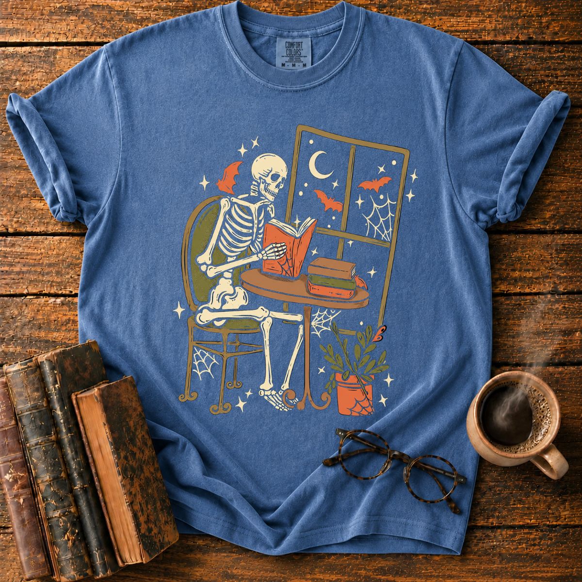 Cozy Skeleton Reading by Moonlight T-Shirt