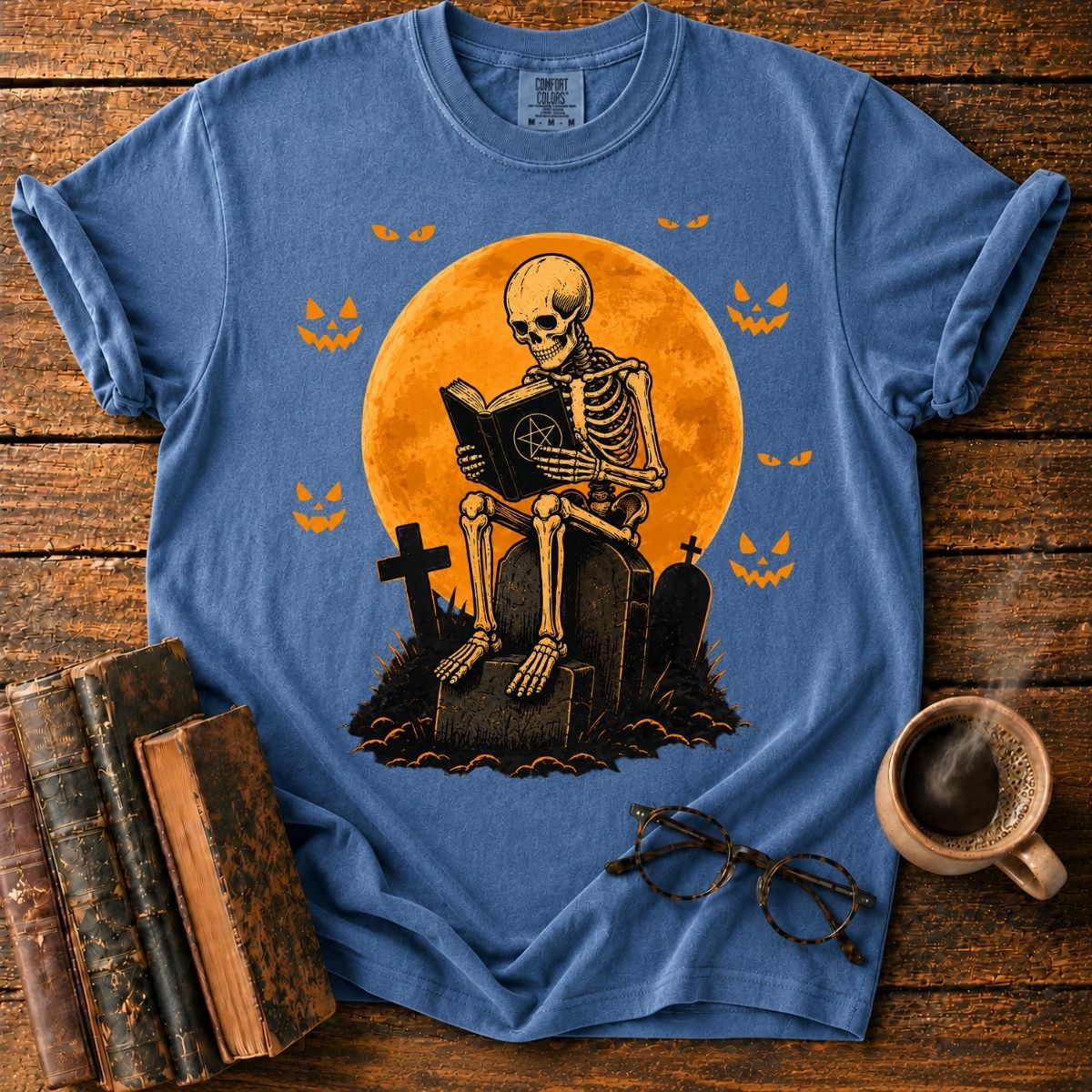 Skeleton Reading Beneath the Pumpkin Moon T-Shirt