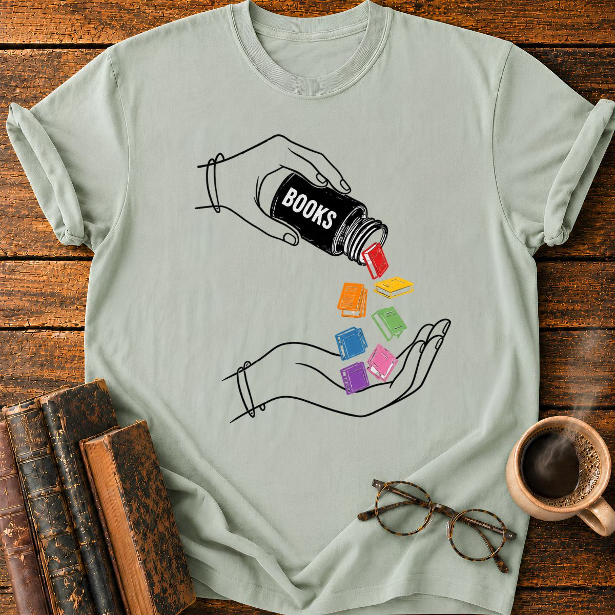 Pouring Books into Open Hands T-Shirt