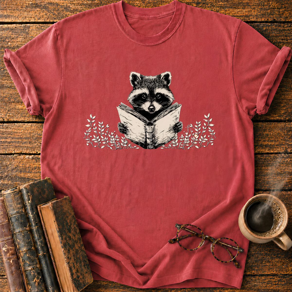 Raccoon Reading Among Leaves T-Shirt