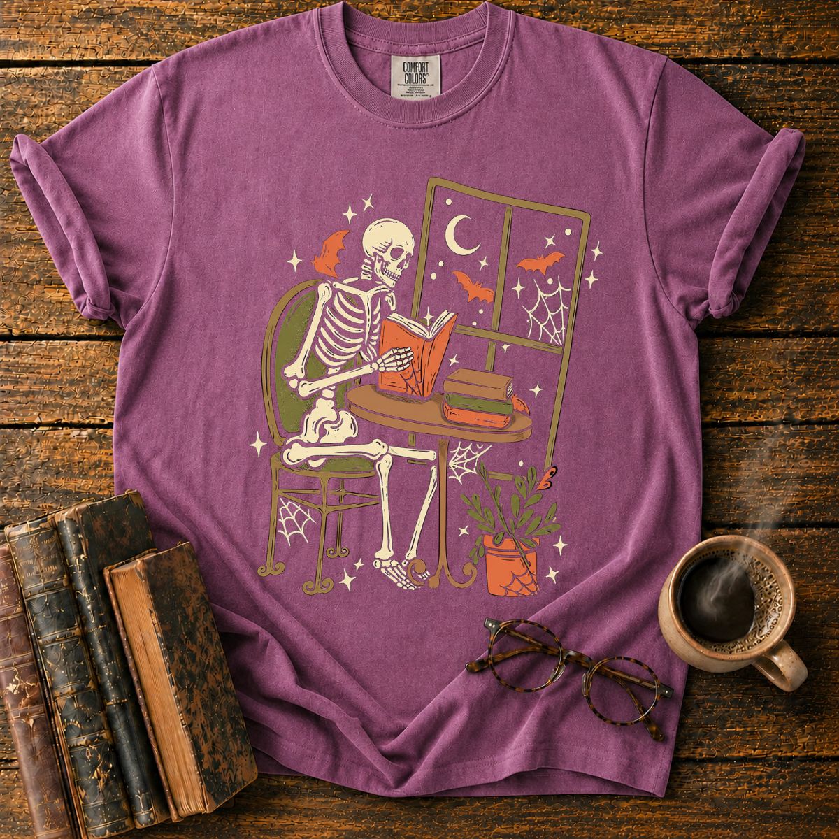 Cozy Skeleton Reading by Moonlight T-Shirt