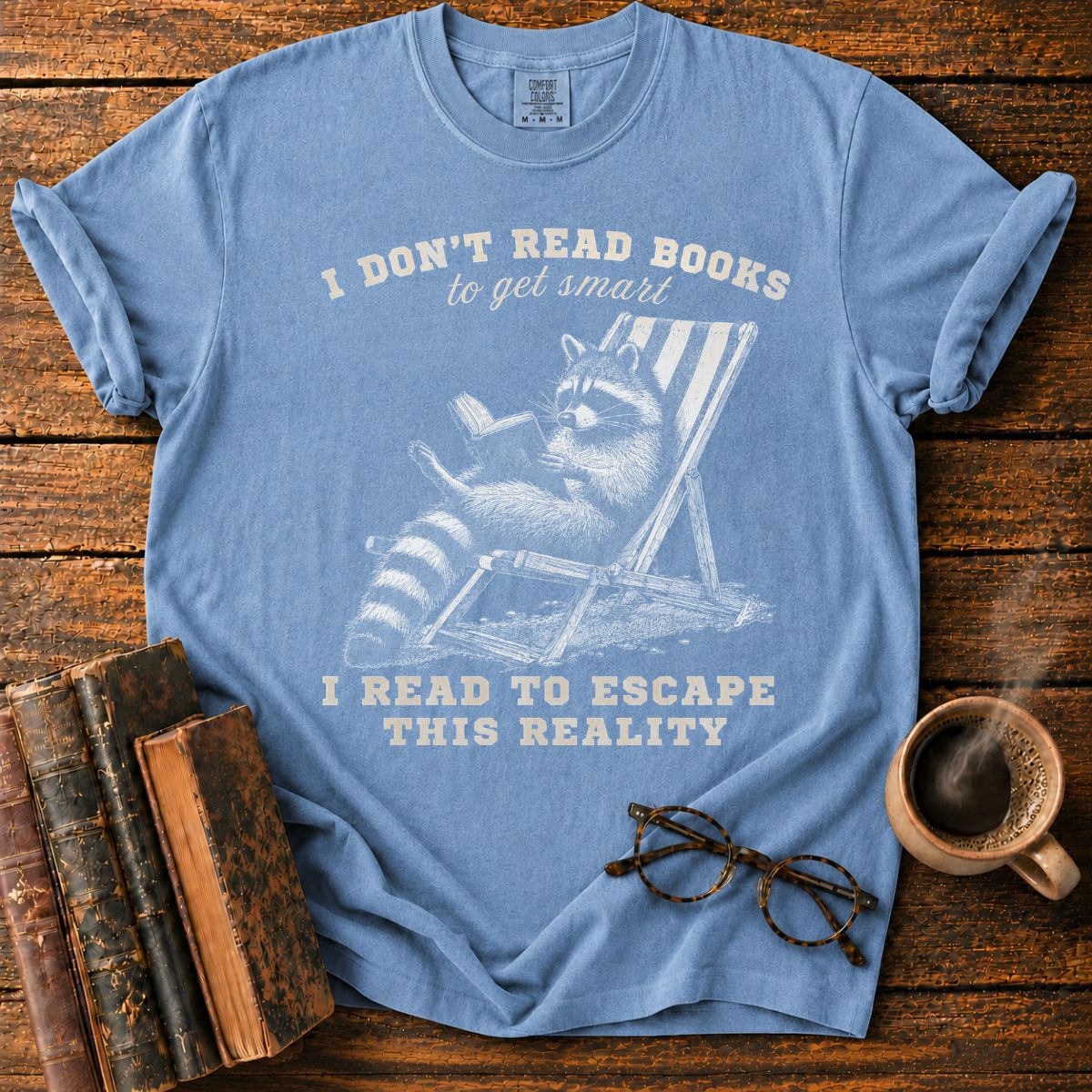 Raccoon Reading in Relaxed Escape T-Shirt