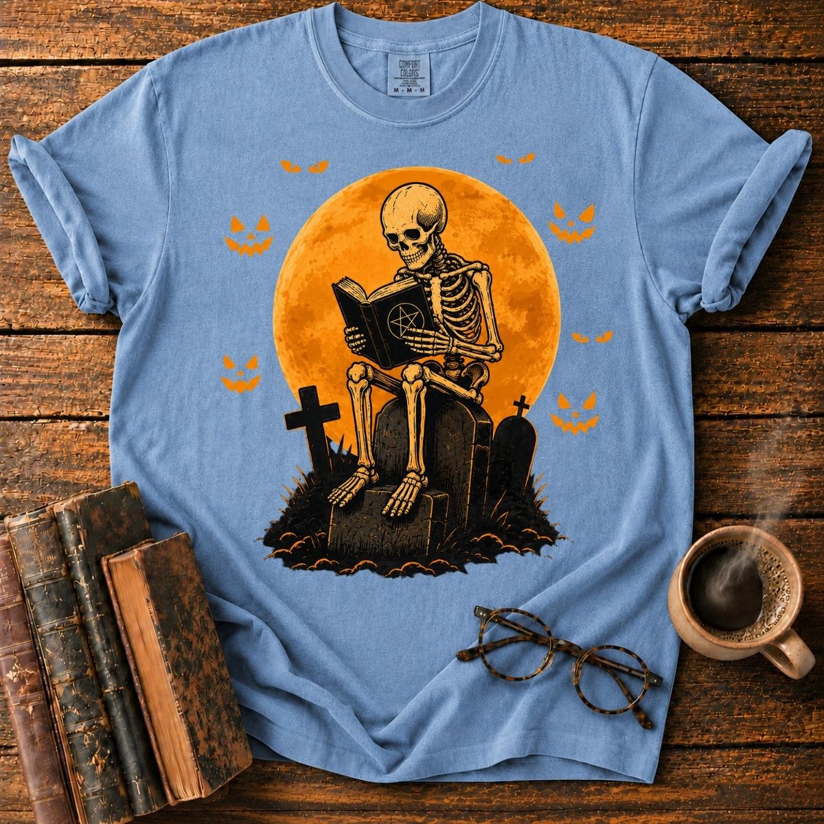 Skeleton Reading Beneath the Pumpkin Moon T-Shirt