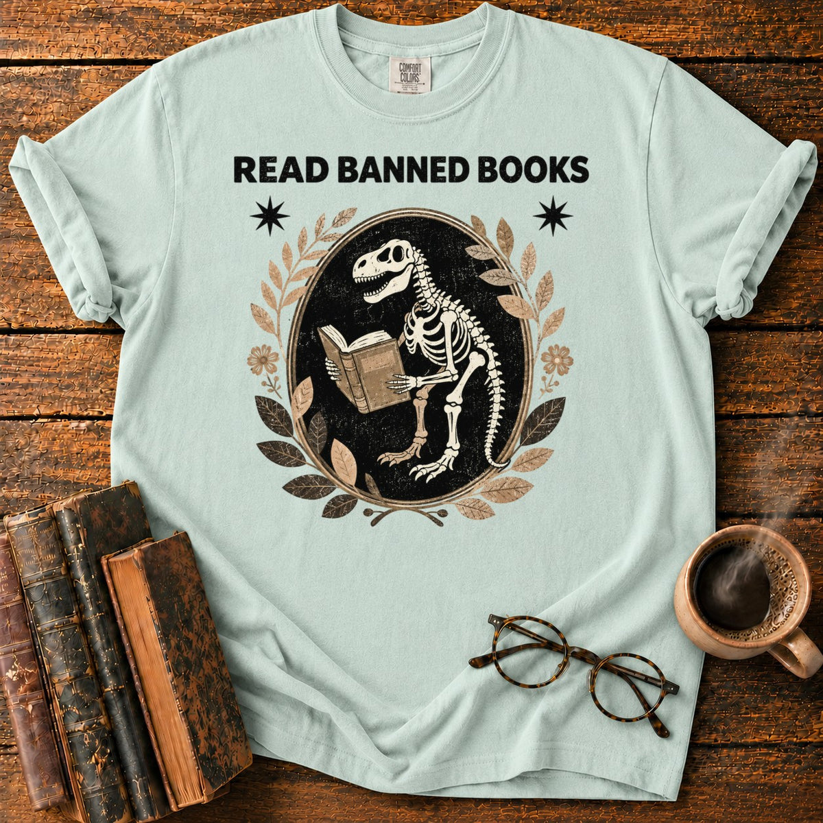 Dinosaur Skeleton Reading Banned Books T-Shirt in Bay – BooksThreads