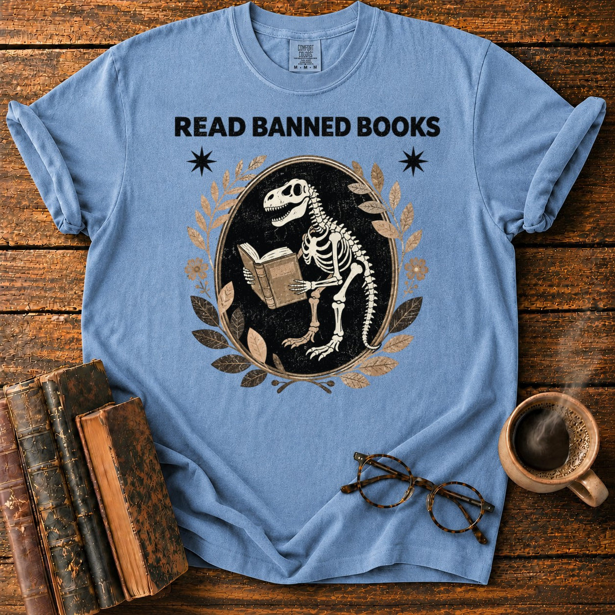Dinosaur Skeleton Reading Banned Books T-Shirt in Blue Jean – BooksThreads