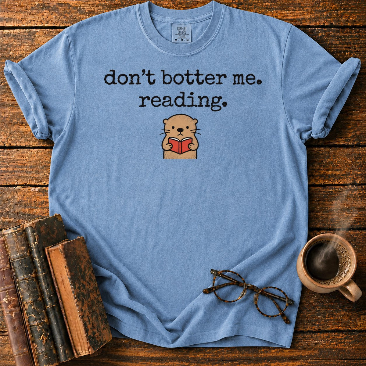 Don’t Botter Me Reading Otter T-Shirt in Blue Jean – BooksThreads