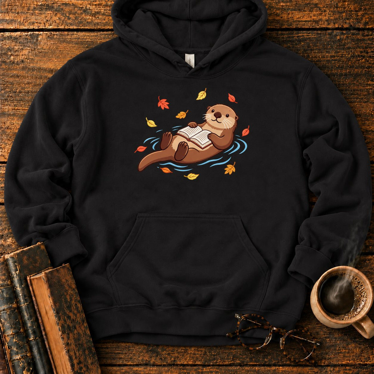 Floating Otter Reading Among Autumn Leaves Hoodie in Black – BooksThreads
