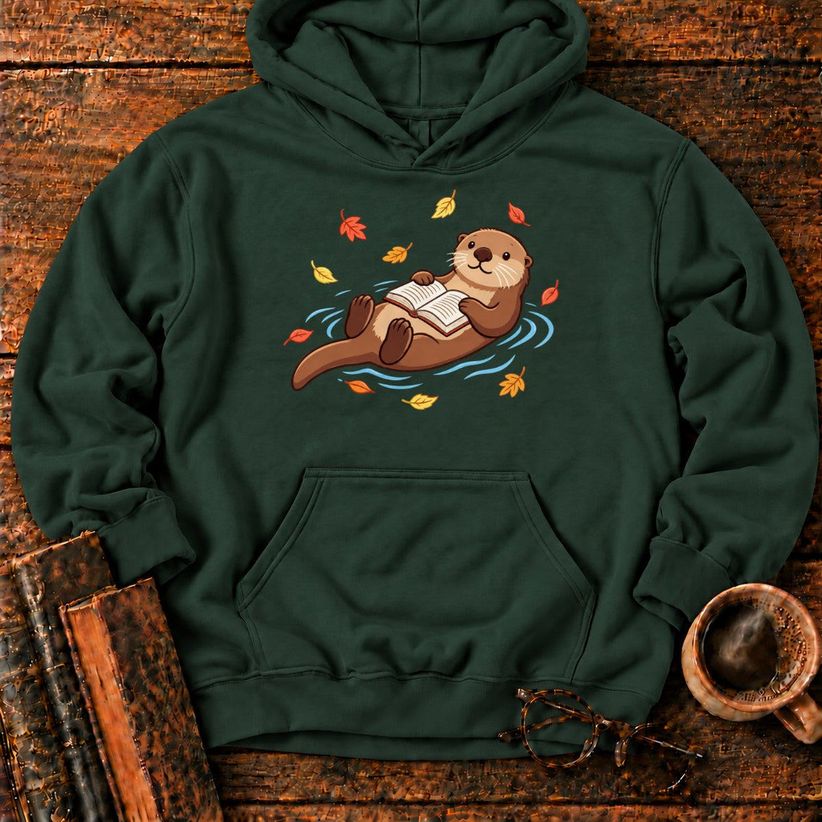 Floating Otter Reading Among Autumn Leaves Hoodie in Forest Green – BooksThreads