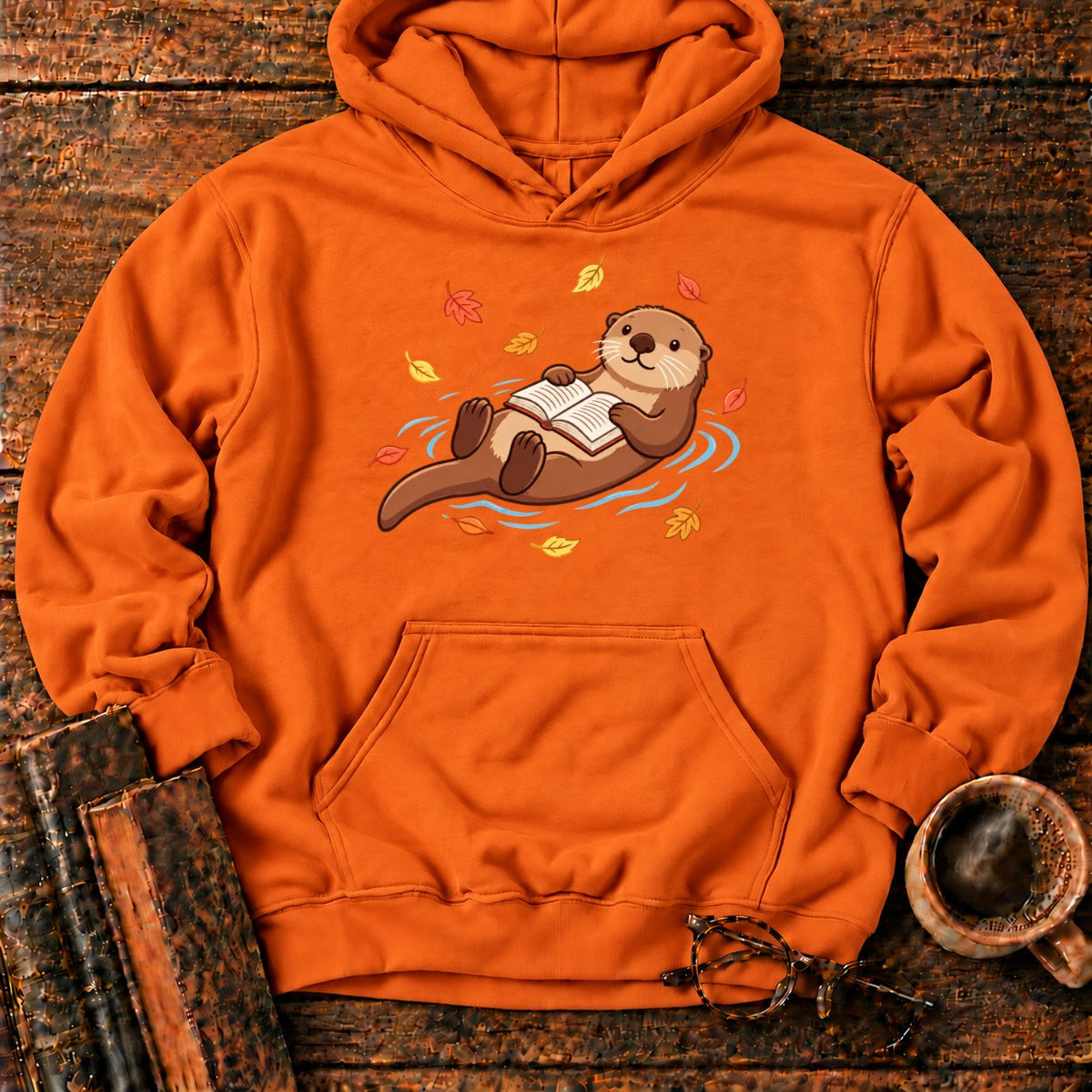 Floating Otter Reading Among Autumn Leaves Hoodie in Orange – BooksThreads