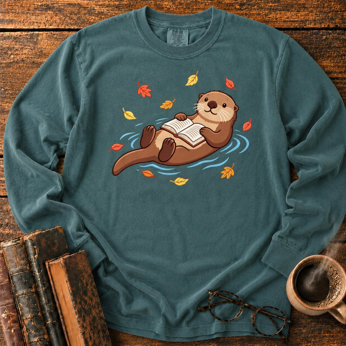 Floating Otter Reading Among Autumn Leaves LS T-Shirt in Blue Spruce – BooksThreads