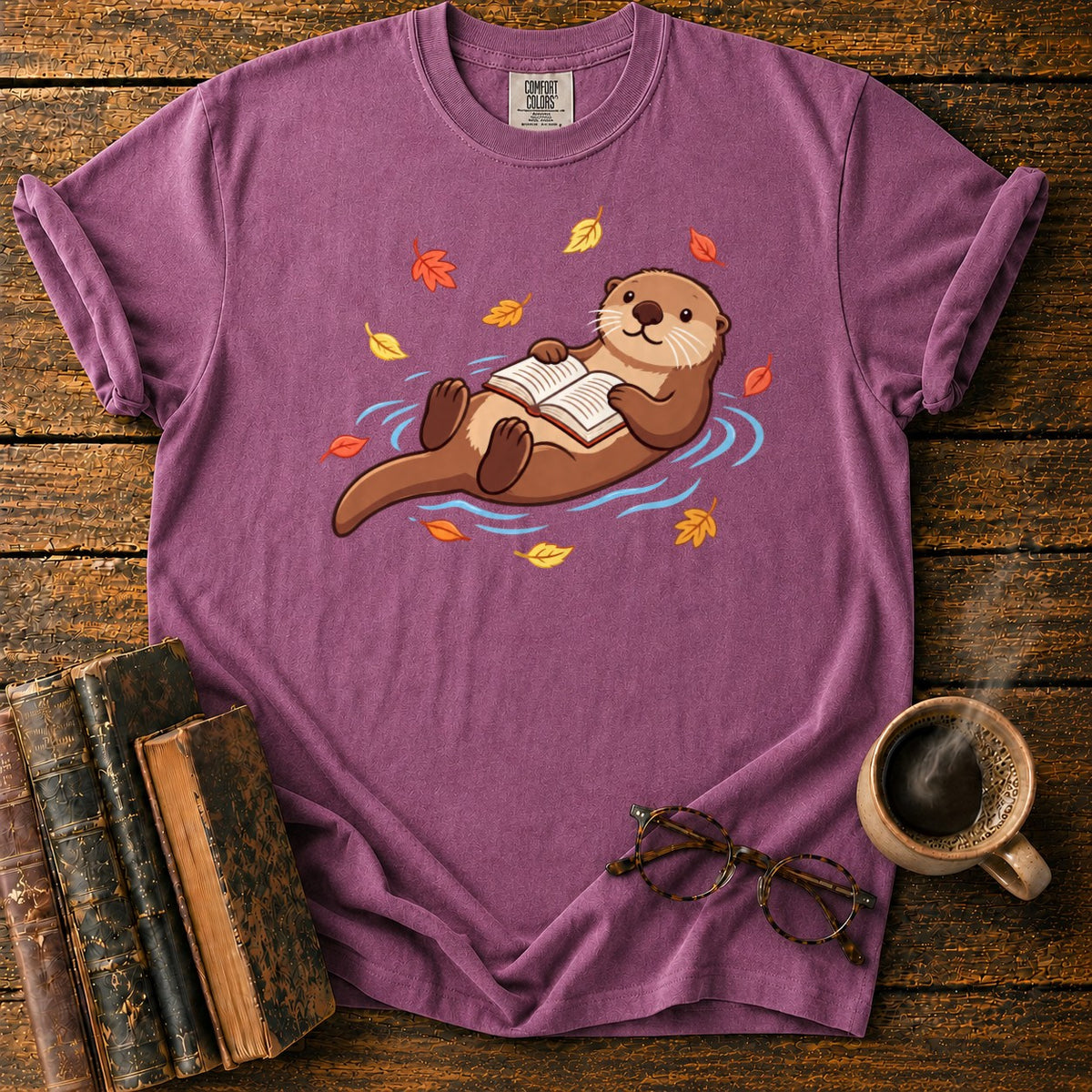 Floating Otter Reading Among Autumn Leaves T-Shirt in Berry – BooksThreads