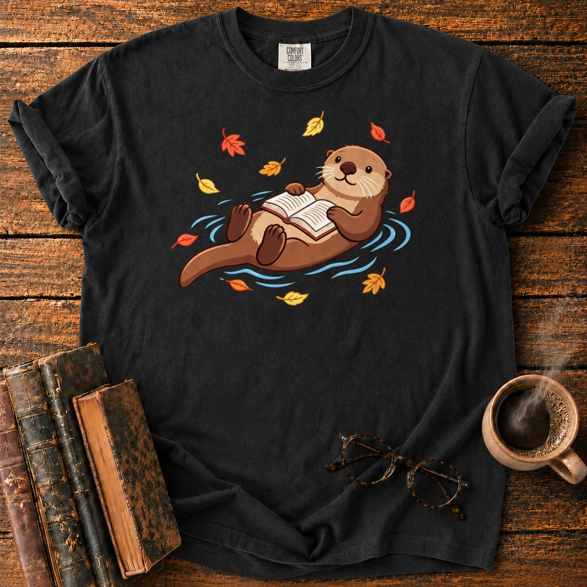 Floating Otter Reading Among Autumn Leaves T-Shirt in Black – BooksThreads