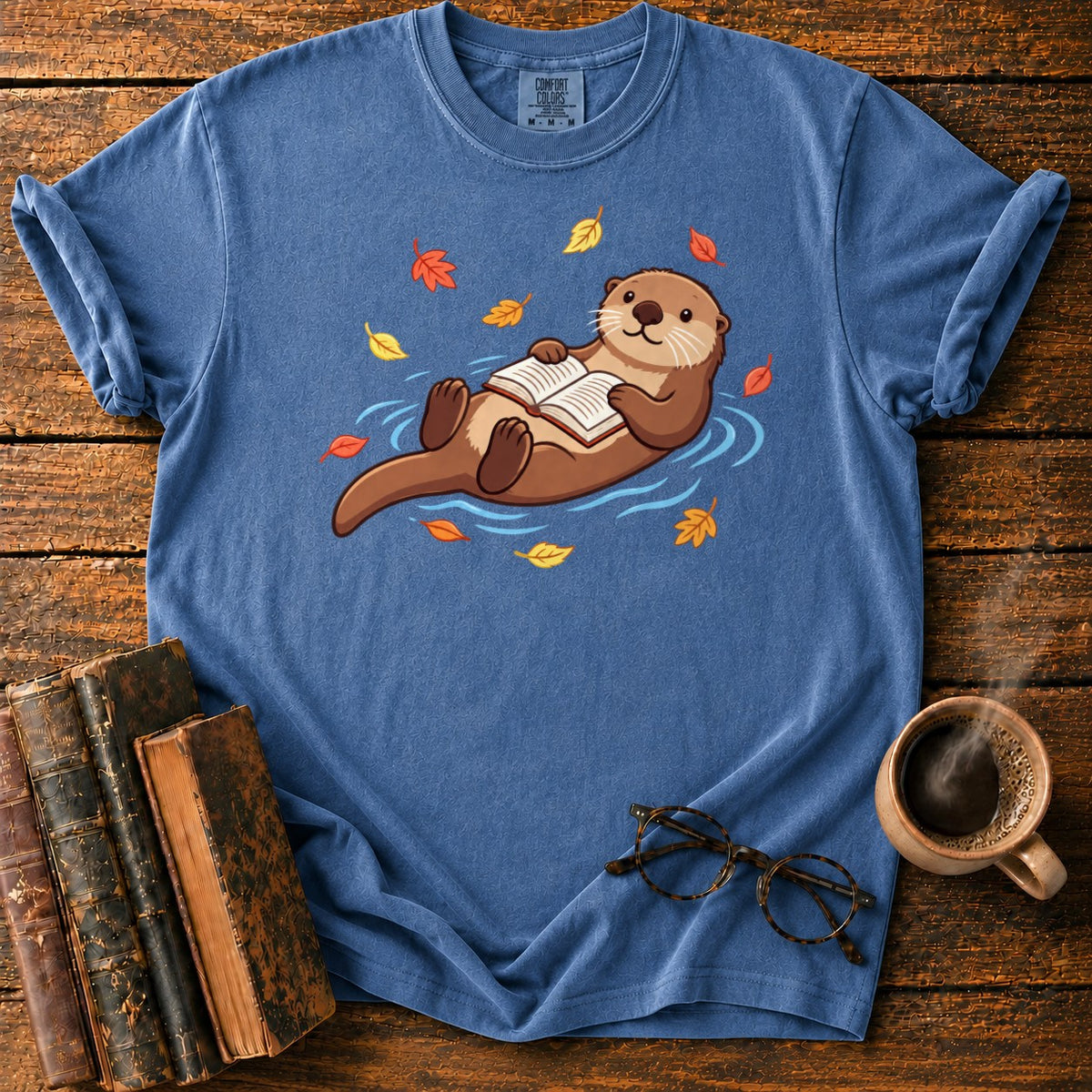Floating Otter Reading Among Autumn Leaves T-Shirt in Denim – BooksThreads