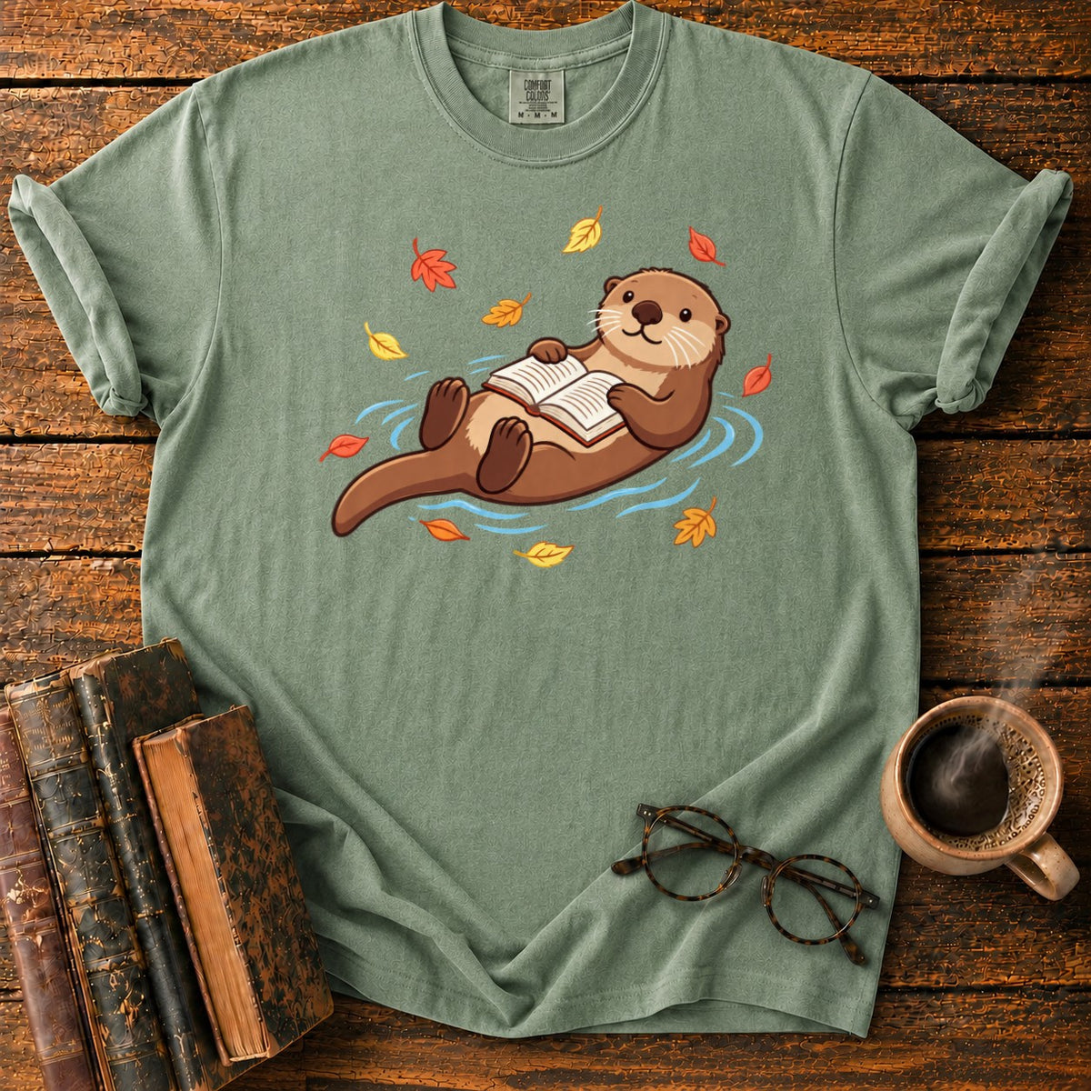 Floating Otter Reading Among Autumn Leaves T-Shirt in Moss – BooksThreads