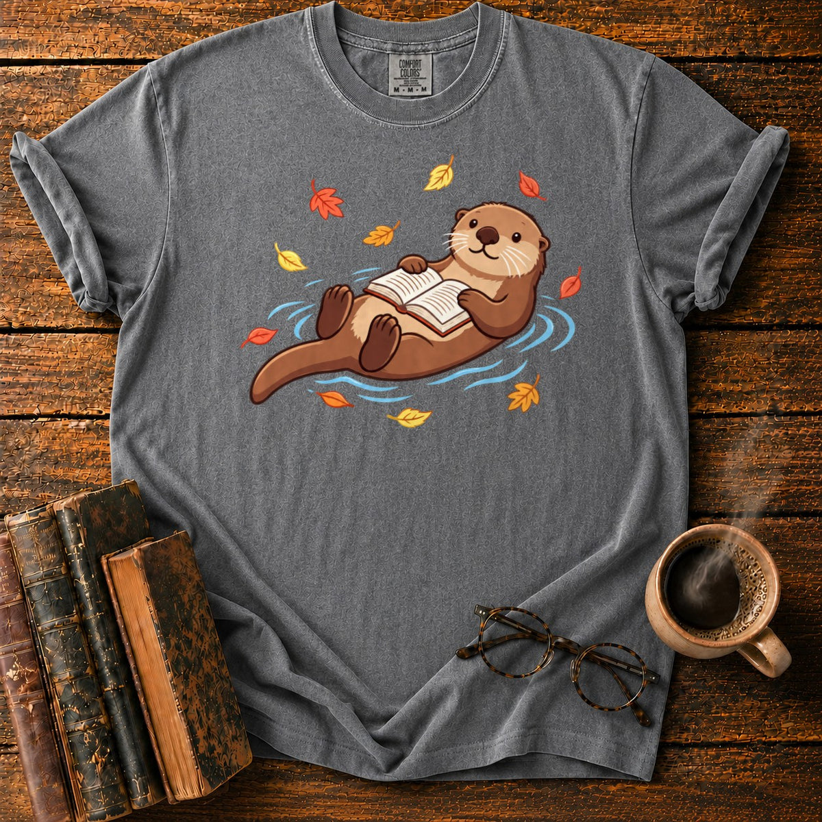 Floating Otter Reading Among Autumn Leaves T-Shirt in Pepper – BooksThreads