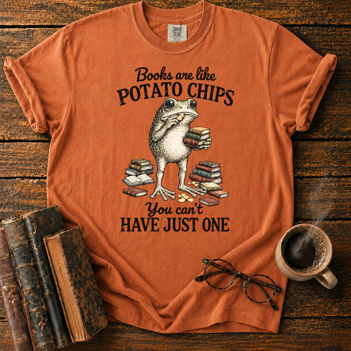 Frog Reading Among Books And Chips T-Shirt in Yam – BooksThreads