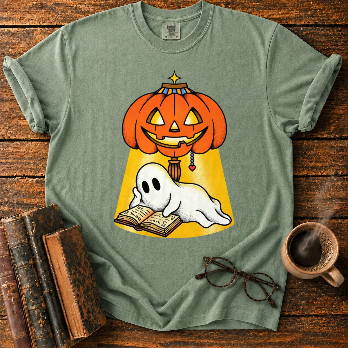 Ghost Reading Under A Pumpkin Lamp T-Shirt in Moss – BooksThreads