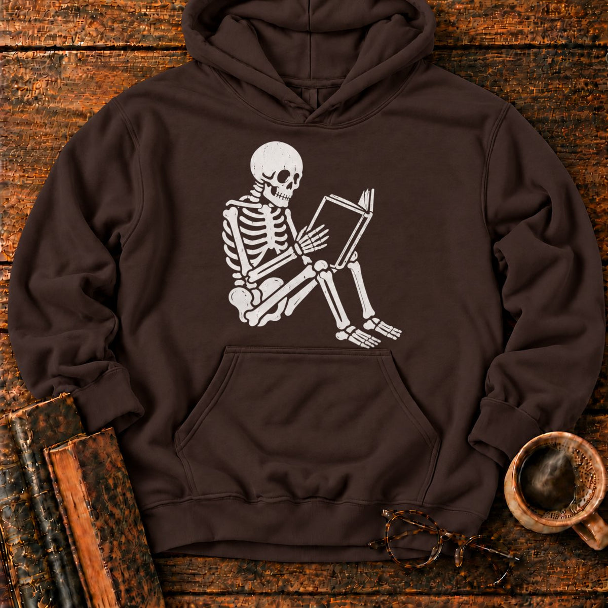 Seated Skeleton Reading An Open Book Hoodie in Dark Chocolate – BooksThreads