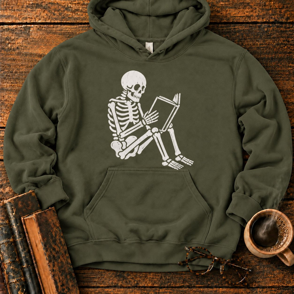 Seated Skeleton Reading An Open Book Hoodie in Military Green – BooksThreads