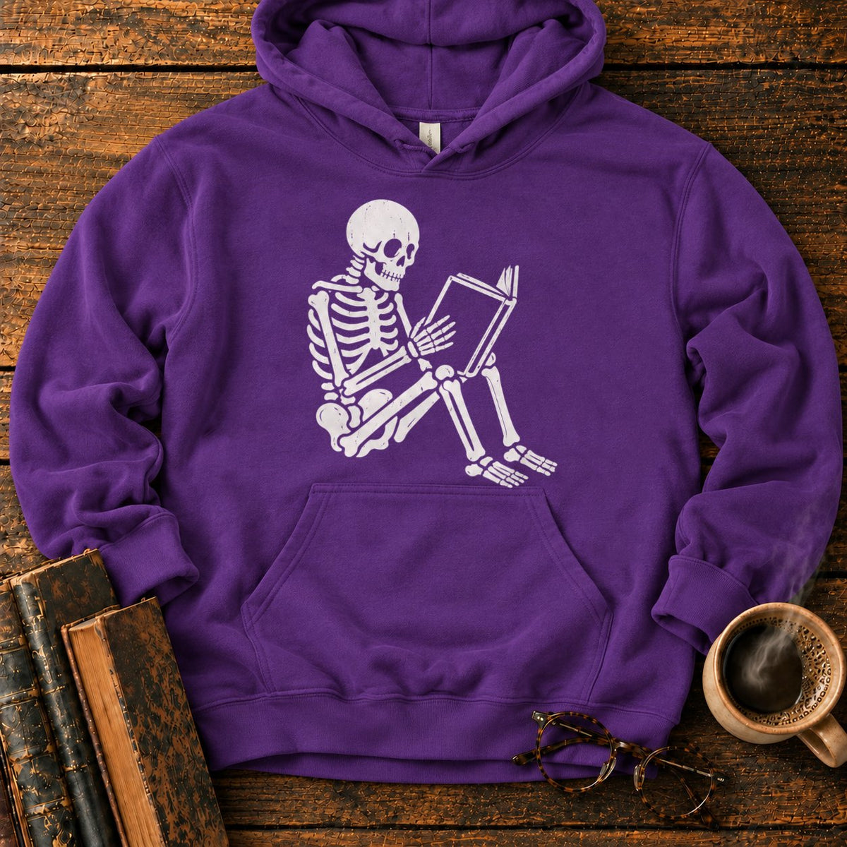Seated Skeleton Reading An Open Book Hoodie in Purple – BooksThreads