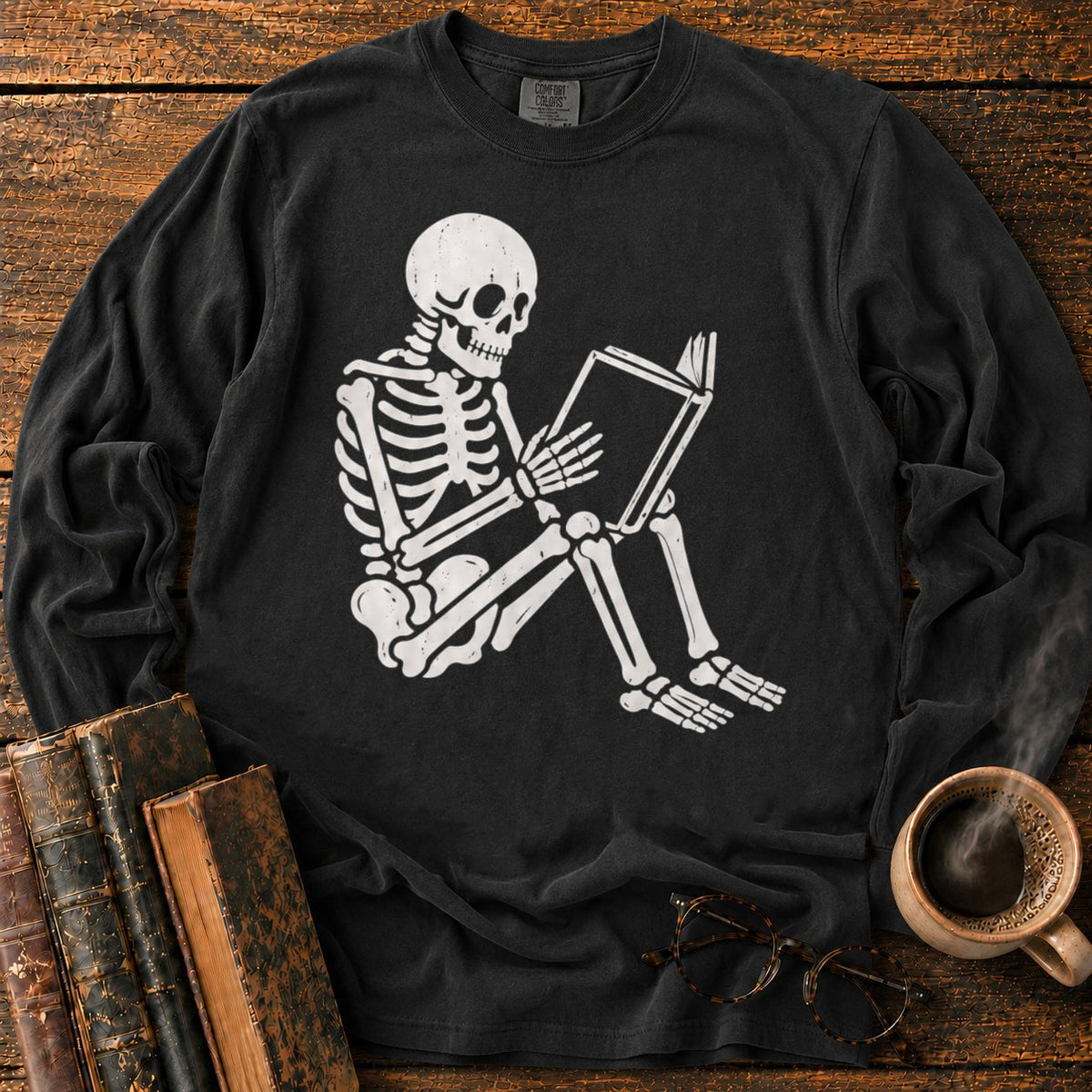 Seated Skeleton Reading An Open Book LS T-Shirt in Black – BooksThreads