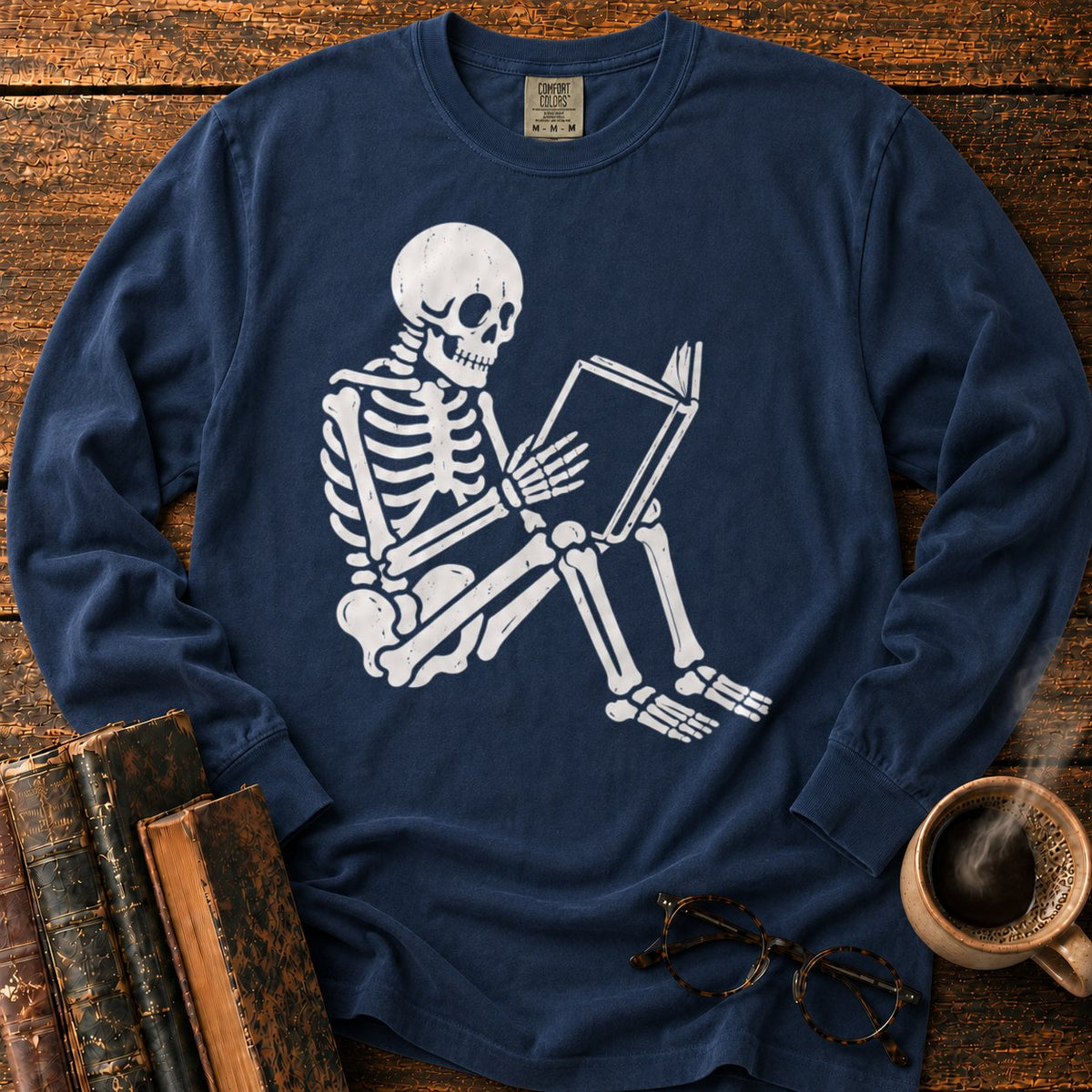 Seated Skeleton Reading An Open Book LS T-Shirt in Midnight – BooksThreads