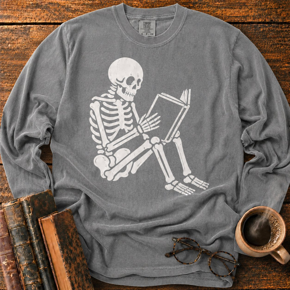 Seated Skeleton Reading An Open Book LS T-Shirt in Pepper – BooksThreads