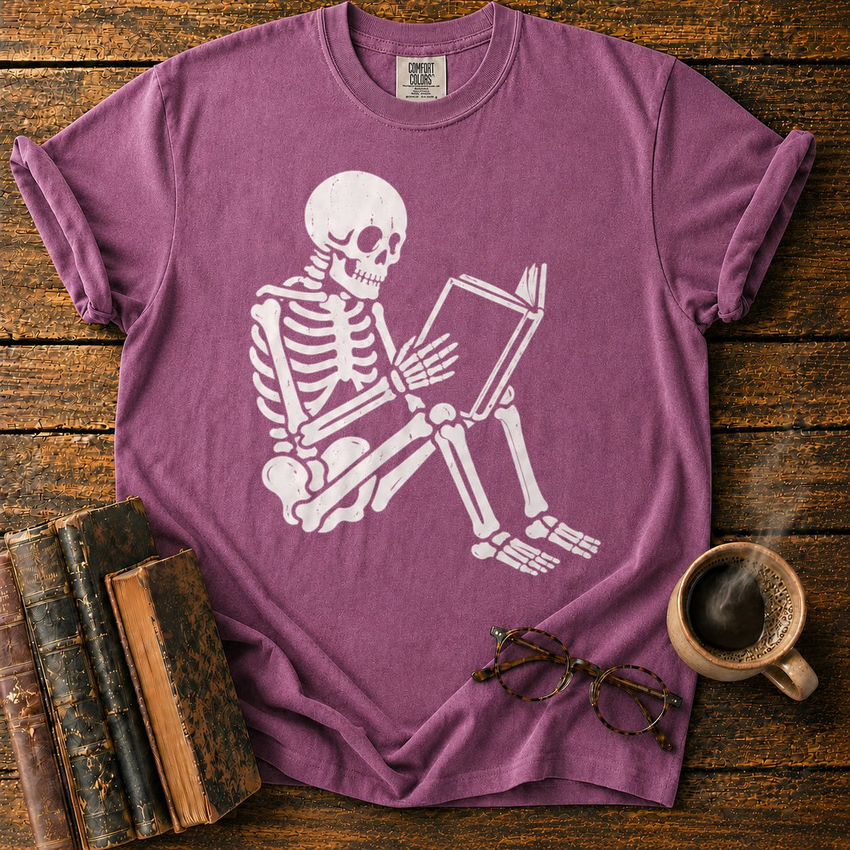 Seated Skeleton Reading An Open Book T-Shirt in Berry – BooksThreads