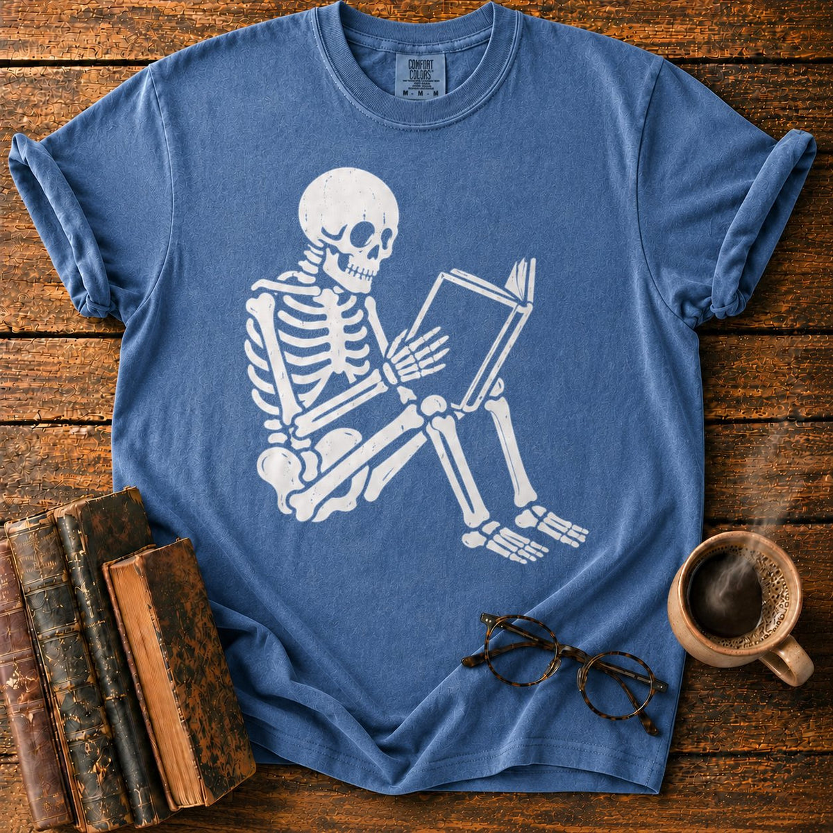 Seated Skeleton Reading An Open Book T-Shirt in Denim – BooksThreads
