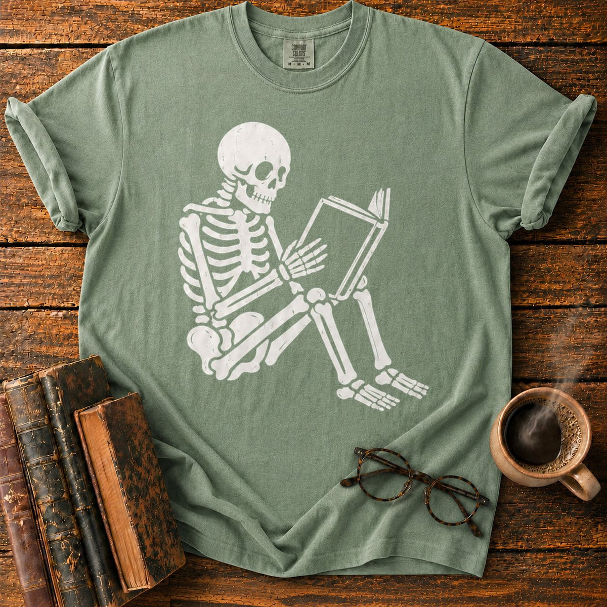 Seated Skeleton Reading An Open Book T-Shirt in Moss – BooksThreads